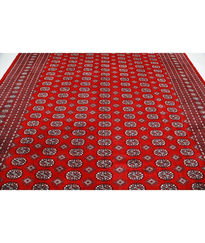 Red Pakistani Bokhara Rug 10' 2" x 13' 5" Hand-Knotted | No. AT92255