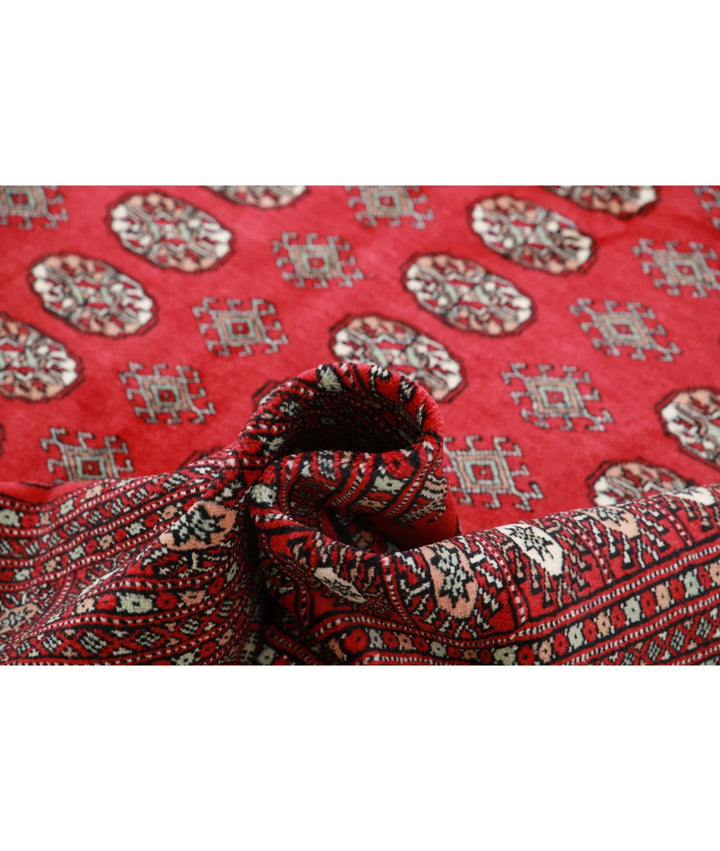 Red Pakistani Bokhara Rug 6' 0" x 8' 10" Hand-Knotted | No. AT944006