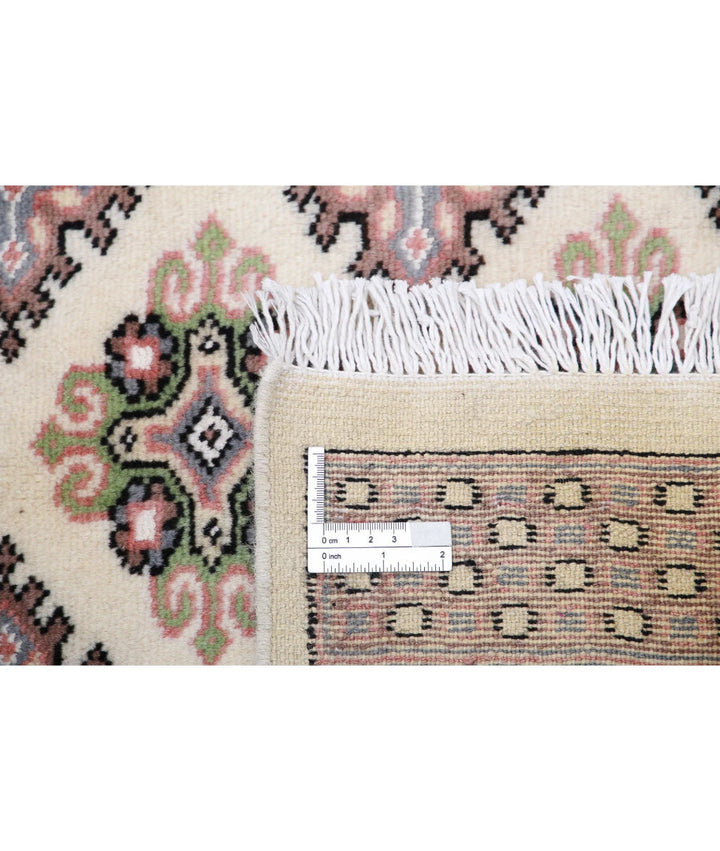 Pakistani Bokhara Rug 6' 0" x 9' 5" Hand-Knotted | No. AT99844