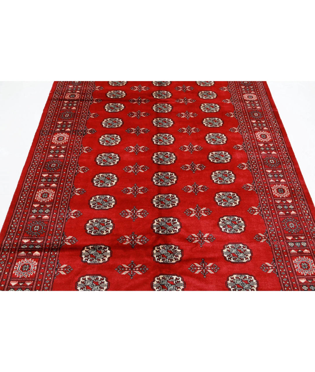 Red Pakistani Tribal Rug 5'7" x 8'7" Hand-Knotted close-up