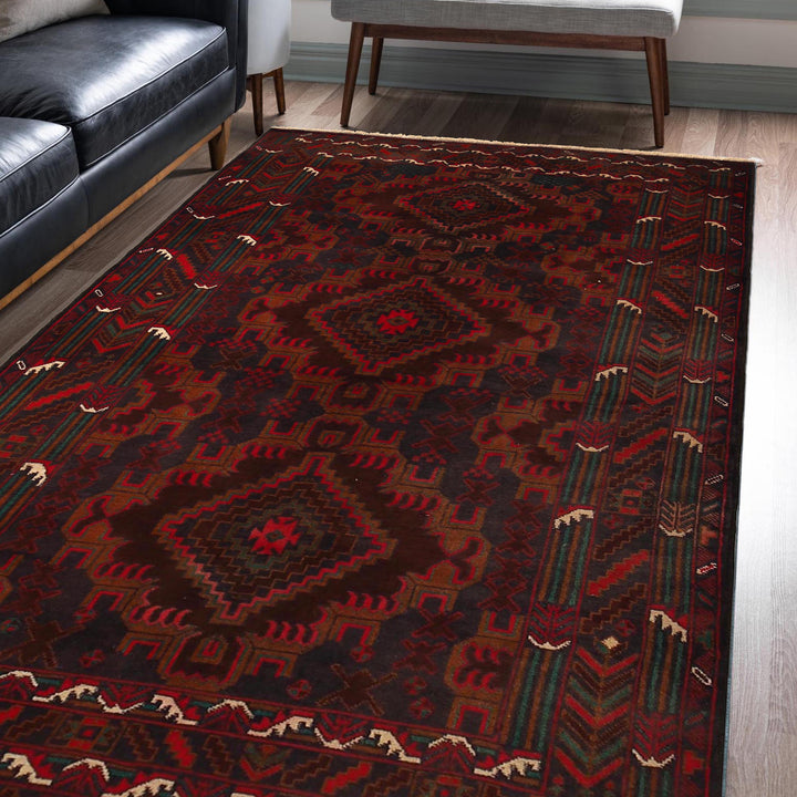 Afghan Baluchi Rug 4' 0" x 6' 4" Hand-Knotted texture