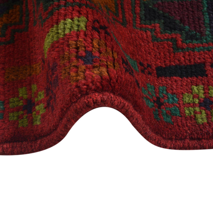 Red Afghan Baluchi Rug 4' 0" x 6' 7" Hand-Knotted field