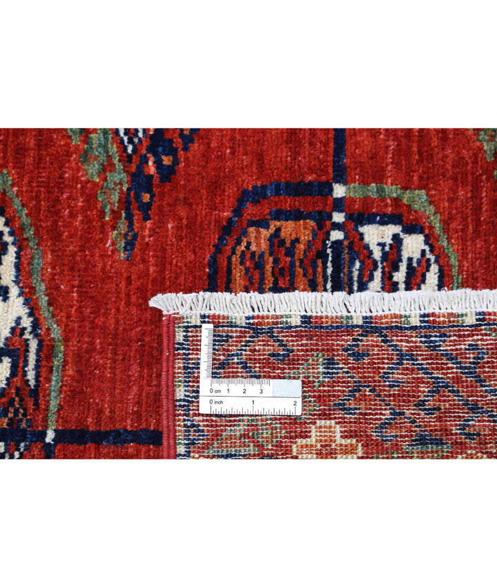 Rust Afghan Bokhara Rug 6' 4" x 9' 6" Hand-Knotted | No. AT27697