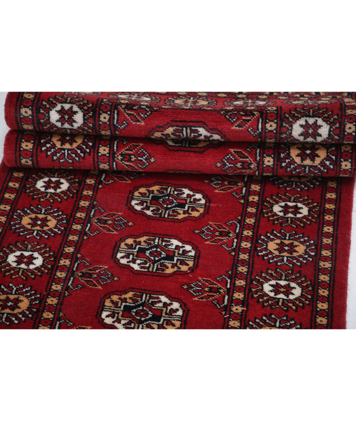 Red Pakistani Bokhara Rug 2' 1" x 6' 2" Hand-Knotted | No. AT22818