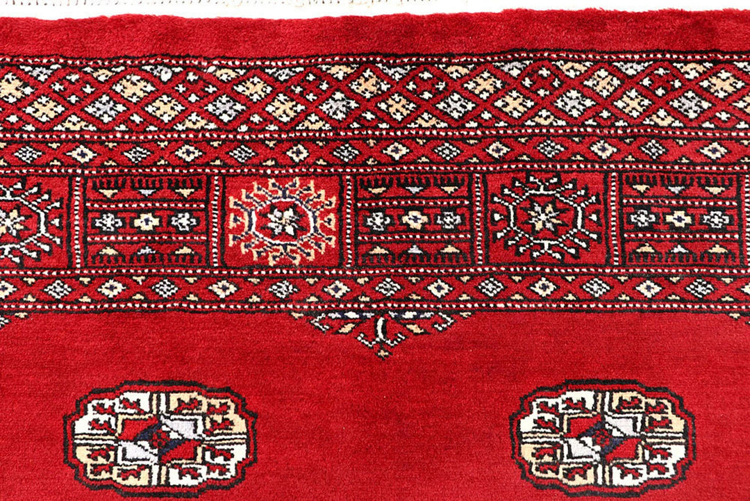 Red Pakistani Bokhara Rug 4' 1" x 6' 2" Hand-Knotted | No. QA10857