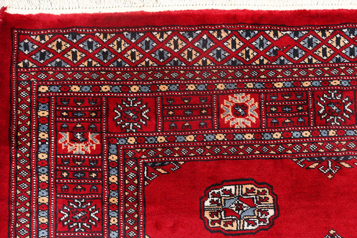 Red Bokhara Rug 4' 1" x 6' 1" Hand-Knotted | No. QA11857