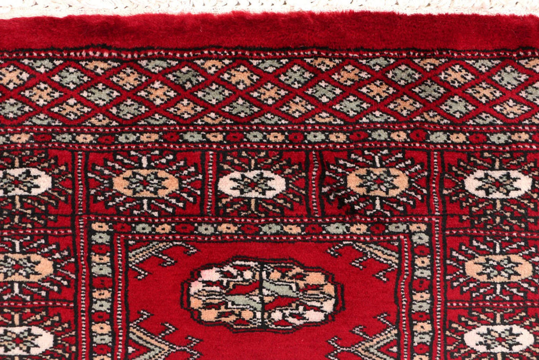 Dark Red Pakistani Bokhara Rug 2' 3" x 5' 9" Hand-Knotted | No. QA13075