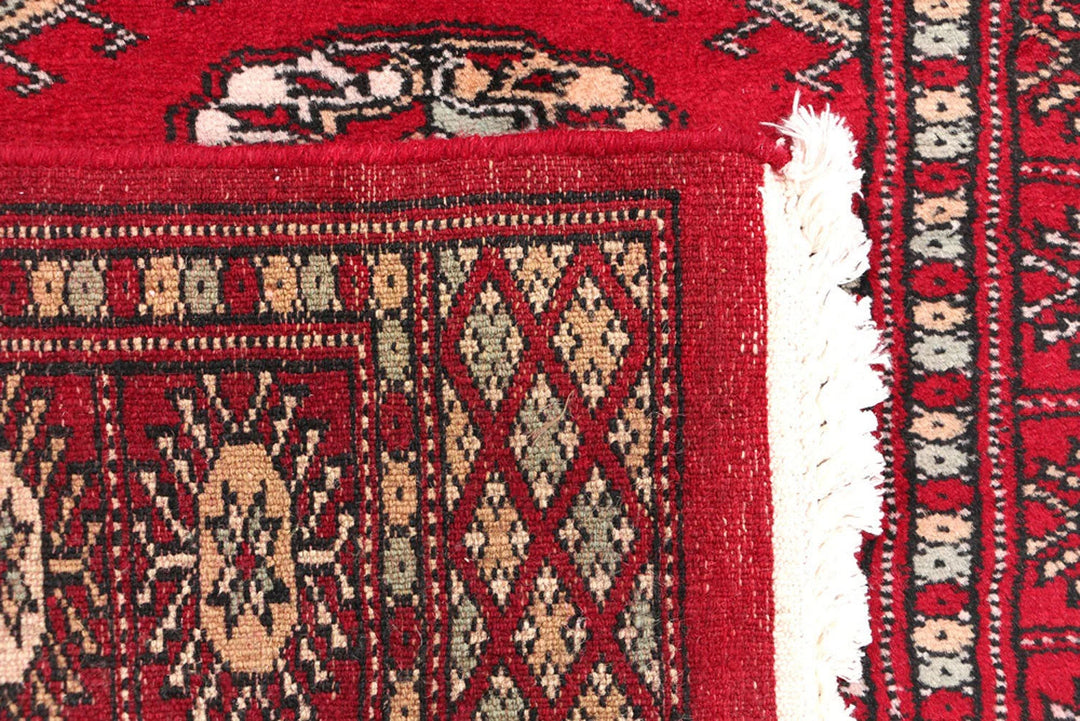 Dark Red Pakistani Bokhara Rug 2' 3" x 5' 9" Hand-Knotted | No. QA13075