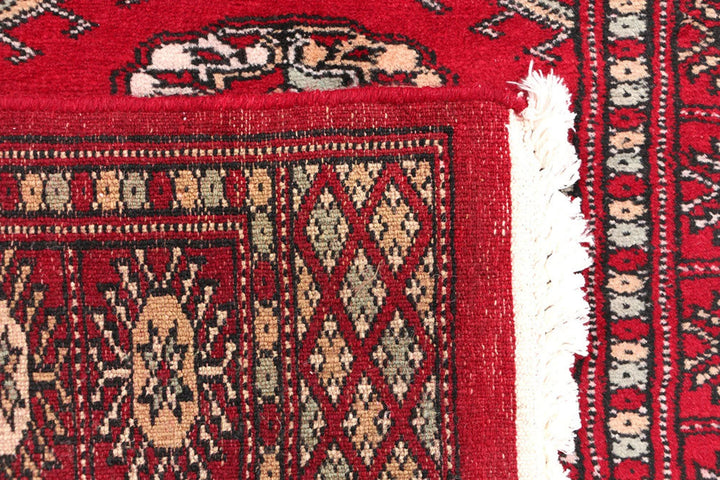 Dark Red Pakistani Bokhara Rug 2' 3" x 5' 9" Hand-Knotted | No. QA13075