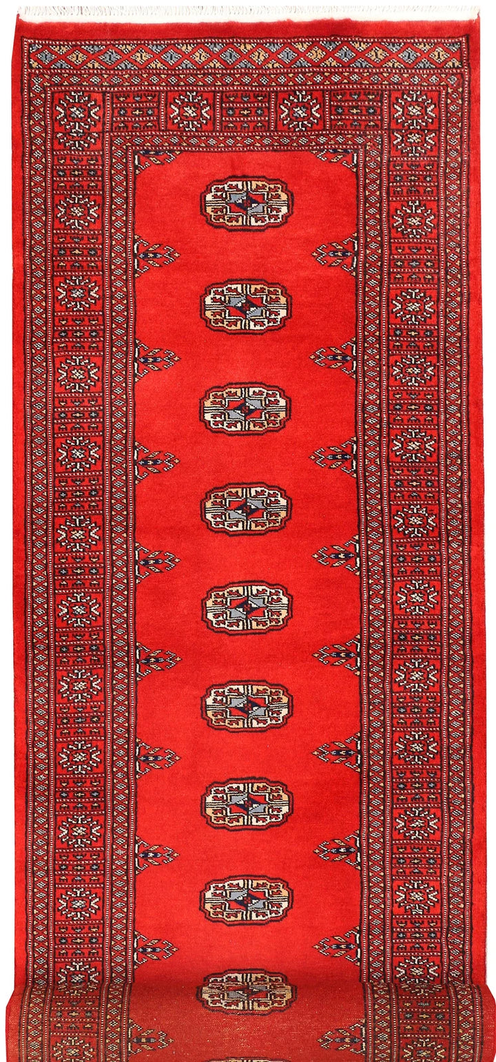Red Pakistani Bokhara Rug 2' 7" x 11' 5" Hand-Knotted | No. QA13228