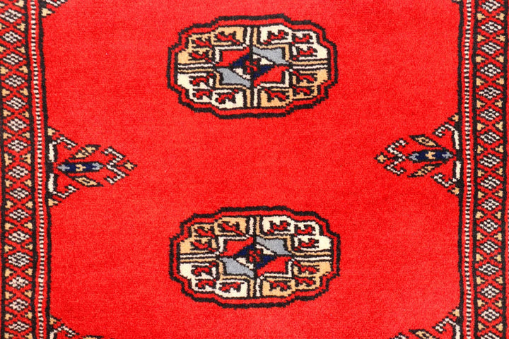 Red Pakistani Bokhara Rug 2' 7" x 11' 5" Hand-Knotted | No. QA13228