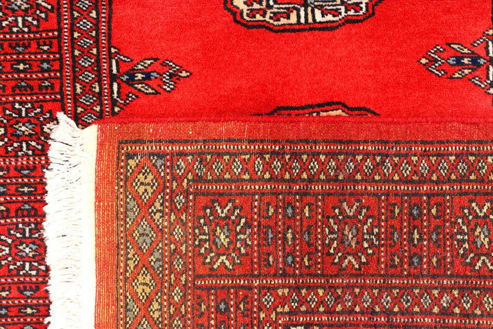 Red Pakistani Bokhara Rug 2' 7" x 11' 5" Hand-Knotted | No. QA13228