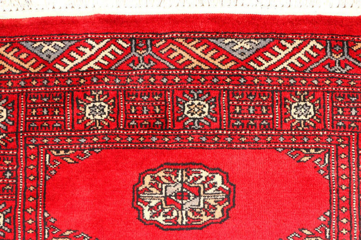 Red Pakistani Bokhara Rug 2' 7" x 8' 10" Hand-Knotted | No. QA13632