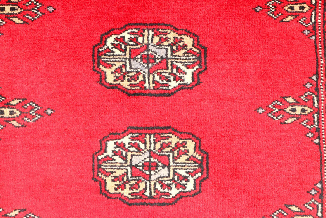 Red Pakistani Bokhara Rug 2' 7" x 8' 10" Hand-Knotted | No. QA13632