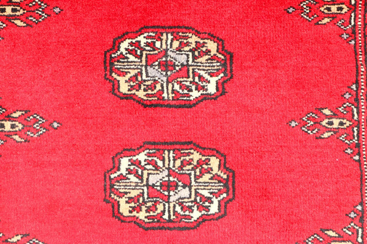 Red Pakistani Bokhara Rug 2' 7" x 8' 10" Hand-Knotted | No. QA13632