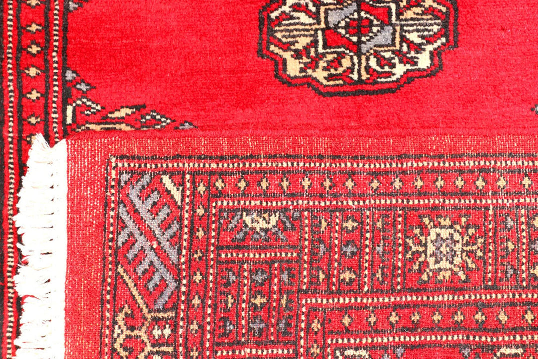 Red Pakistani Bokhara Rug 2' 7" x 8' 10" Hand-Knotted | No. QA13632