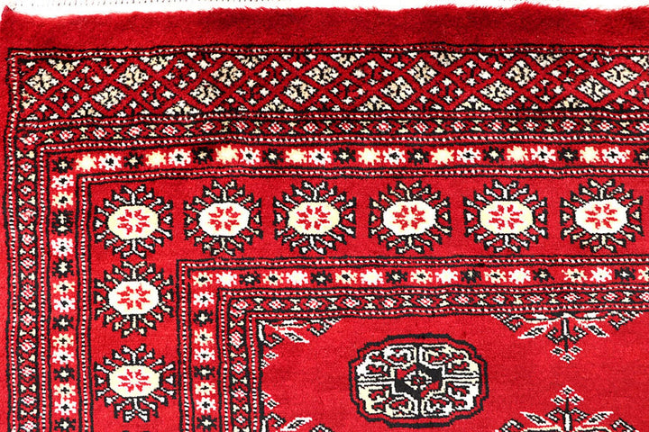 Red Pakistani Bokhara Rug 3' 11" x 6' 6" Hand-Knotted | No. QA13964