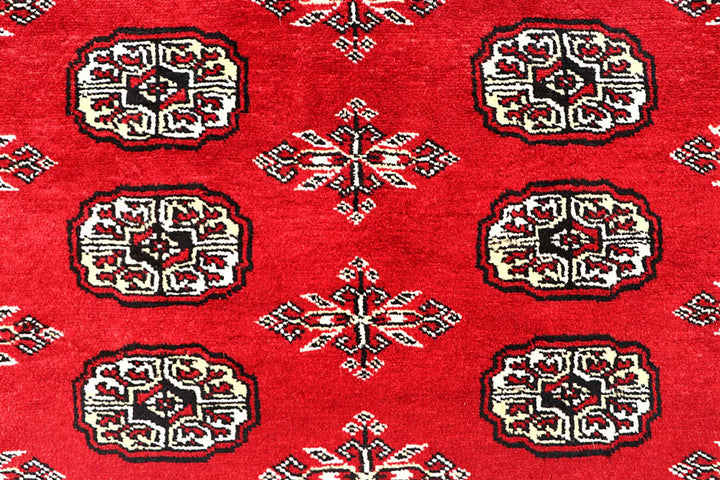 Red Pakistani Bokhara Rug 3' 11" x 6' 6" Hand-Knotted | No. QA13964