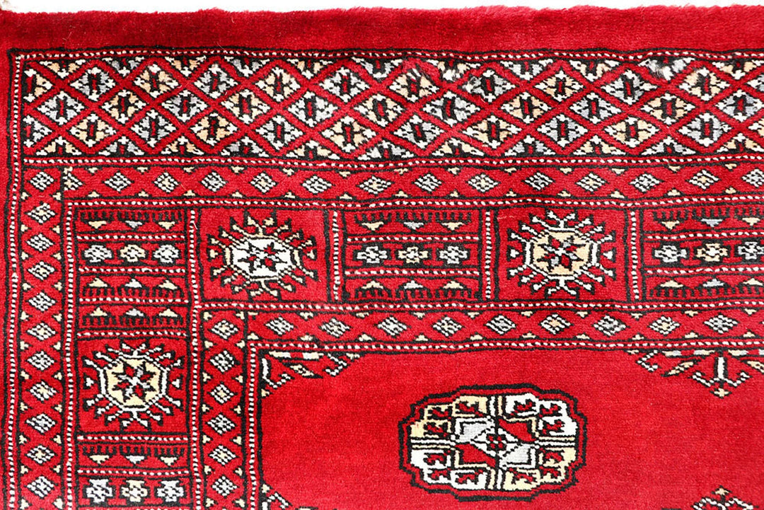Red Bokhara Rug 3' 11" x 6' 5" Hand-Knotted | No. QA14330