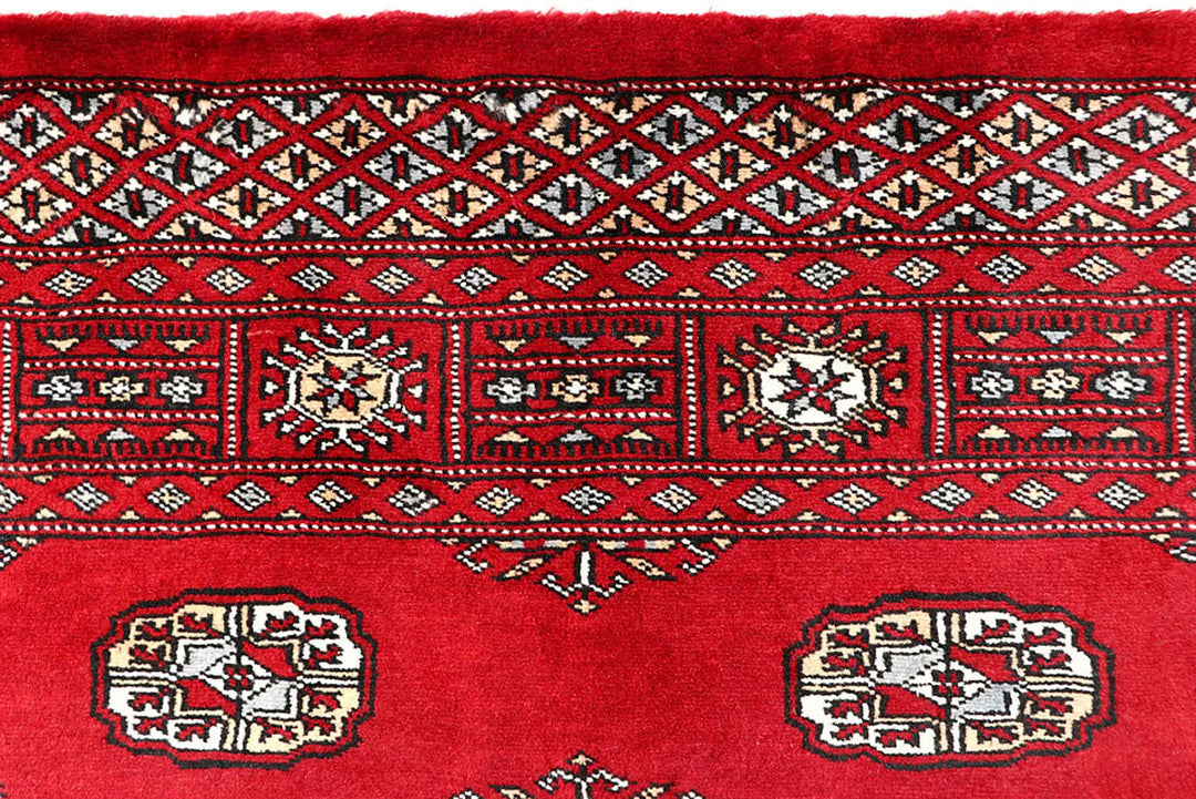 Red Bokhara Rug 3' 11" x 6' 5" Hand-Knotted | No. QA14330