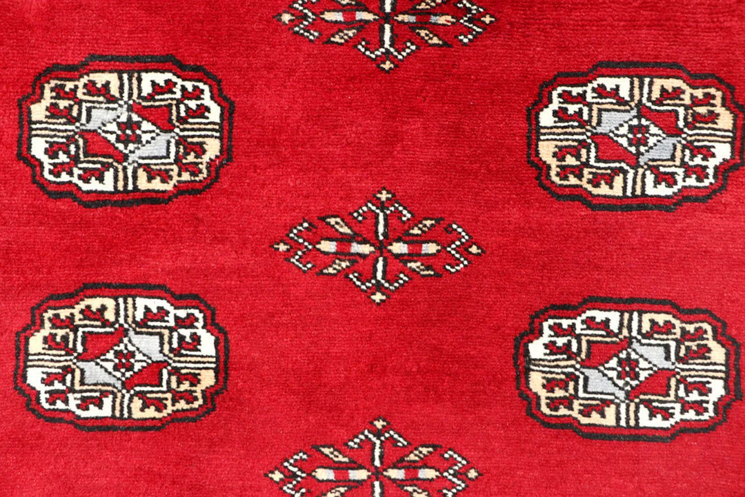 Red Bokhara Rug 3' 11" x 6' 5" Hand-Knotted | No. QA14330