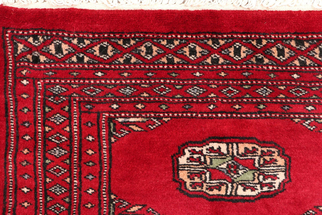 Red Pakistani Bokhara Rug 2' 1" x 5' 8" Hand-Knotted | No. QA14525