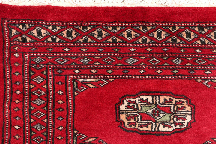 Red Pakistani Bokhara Rug 2' 1" x 5' 8" Hand-Knotted | No. QA14525