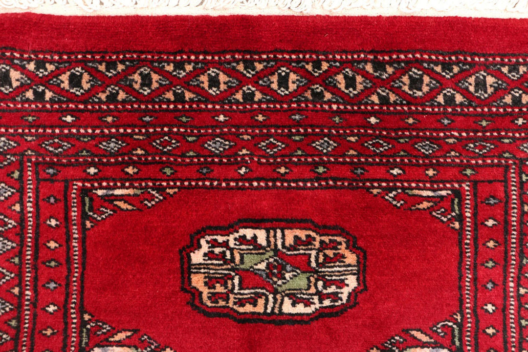 Red Pakistani Bokhara Rug 2' 1" x 5' 8" Hand-Knotted | No. QA14525