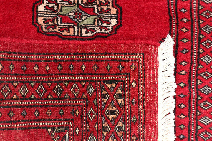 Red Pakistani Bokhara Rug 2' 1" x 5' 8" Hand-Knotted | No. QA14525