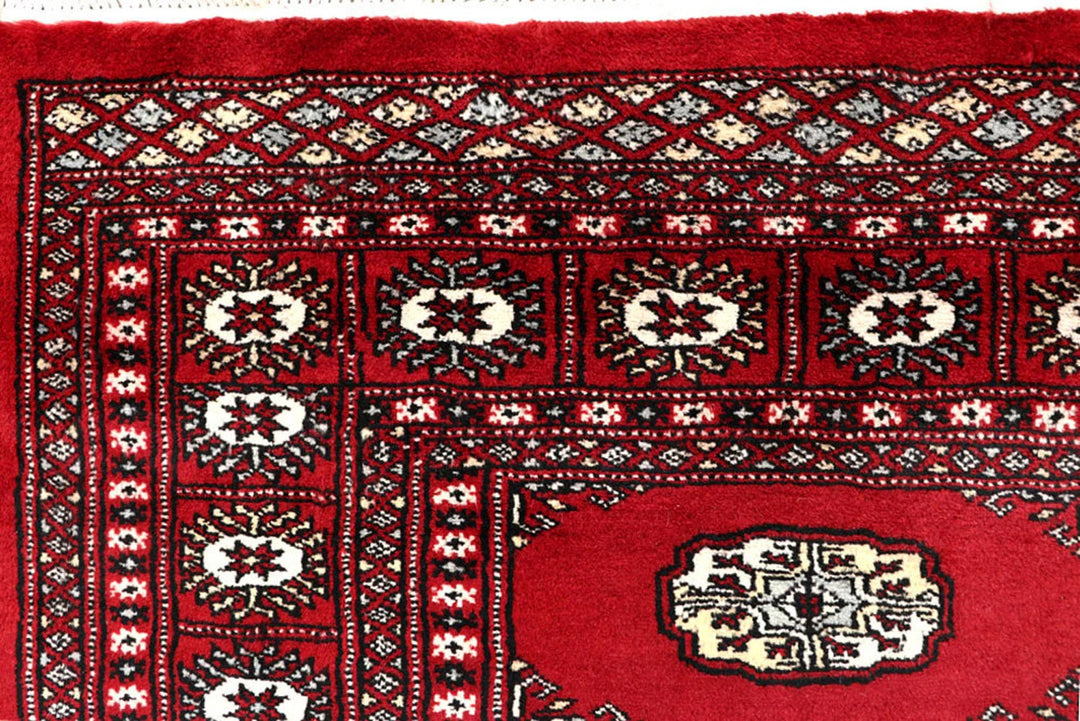 Red Bokhara Rug 5' 11" x 8' 2" Hand-Knotted | No. QA15608