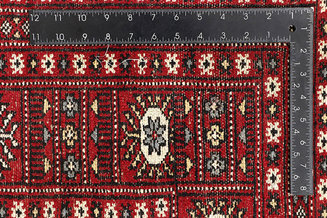 Red Pakistani Bokhara Rug 6' 1" x 8' 11" Hand-Knotted | No. QA15645
