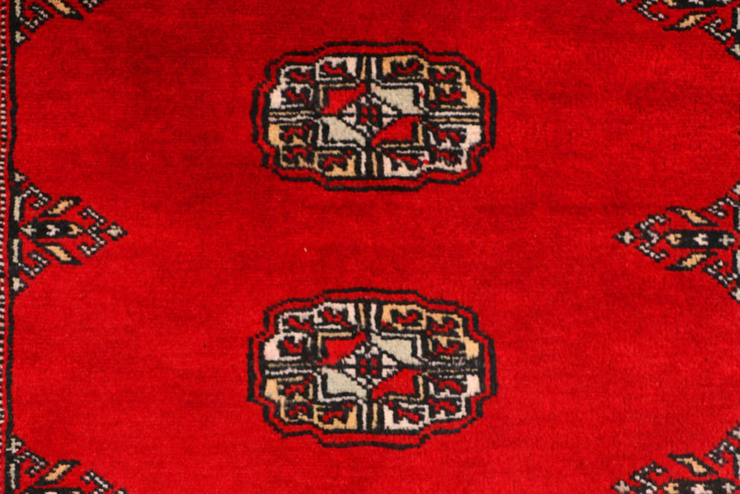 Red Pakistani Bokhara Rug 3' 1" x 5' Hand-Knotted | No. QA15693