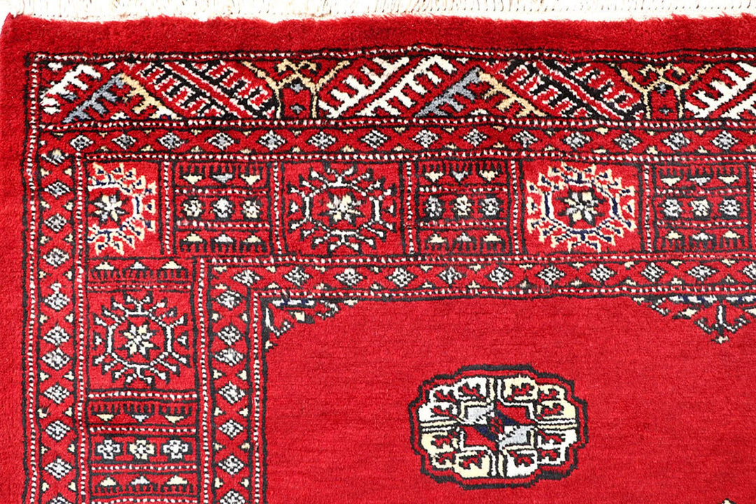 Red Pakistani Bokhara Rug 4' 2" x 6' 7" Hand-Knotted | No. QA15941