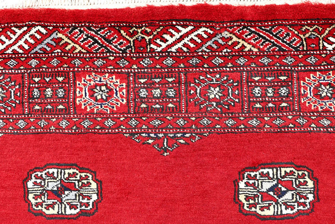 Red Pakistani Bokhara Rug 4' 2" x 6' 7" Hand-Knotted | No. QA15941