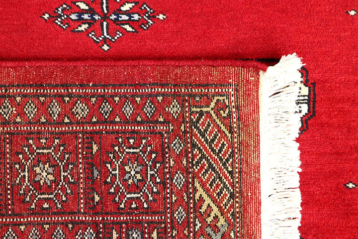 Red Pakistani Bokhara Rug 4' 2" x 6' 7" Hand-Knotted | No. QA15941