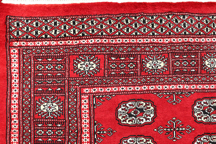Firebrick Pakistani Bokhara Rug 5' 1" x 8' Hand-Knotted | No. QA16041