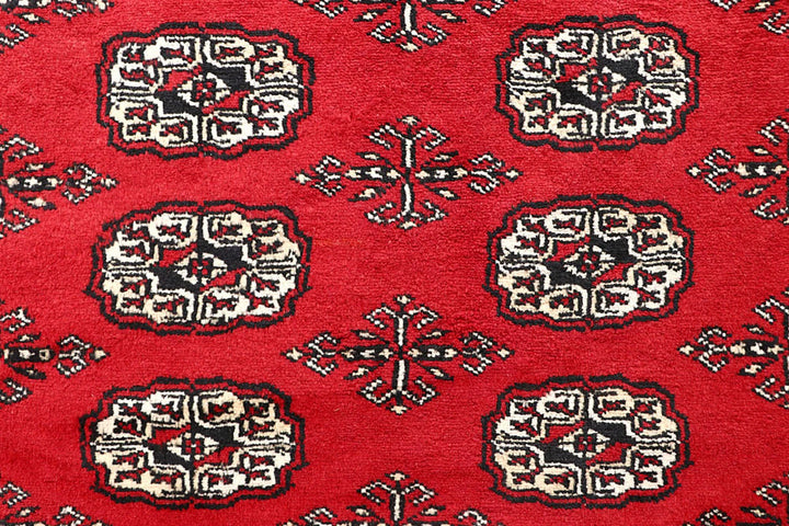 Firebrick Pakistani Bokhara Rug 5' 1" x 8' Hand-Knotted | No. QA16041