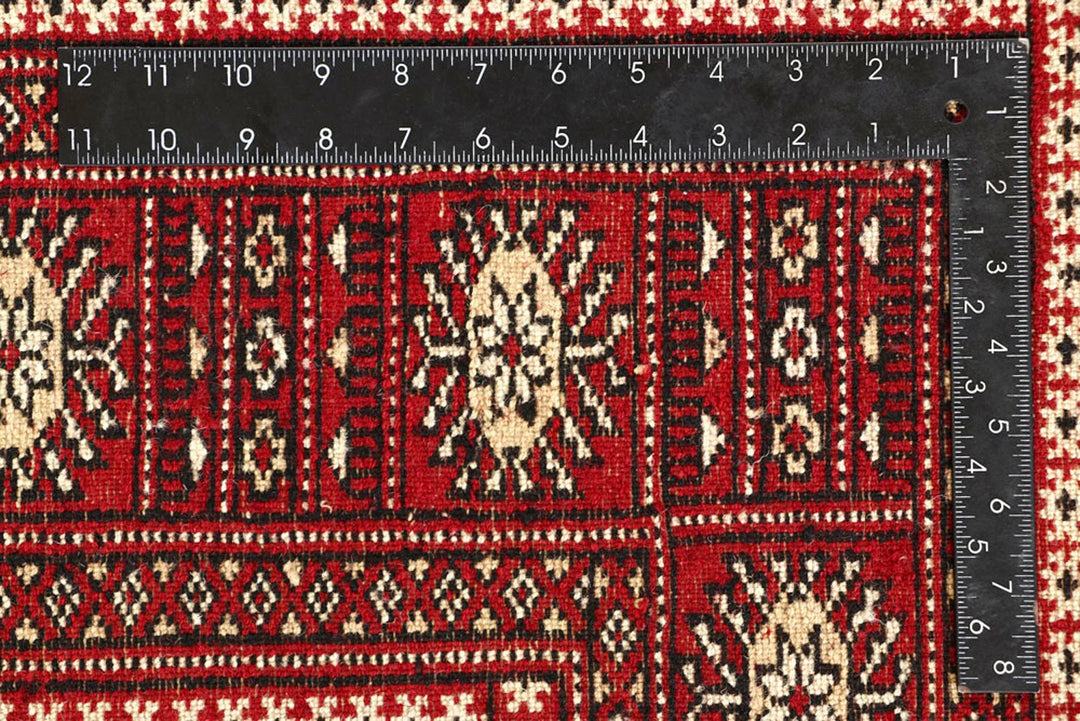 Firebrick Pakistani Bokhara Rug 5' 1" x 8' Hand-Knotted | No. QA16041