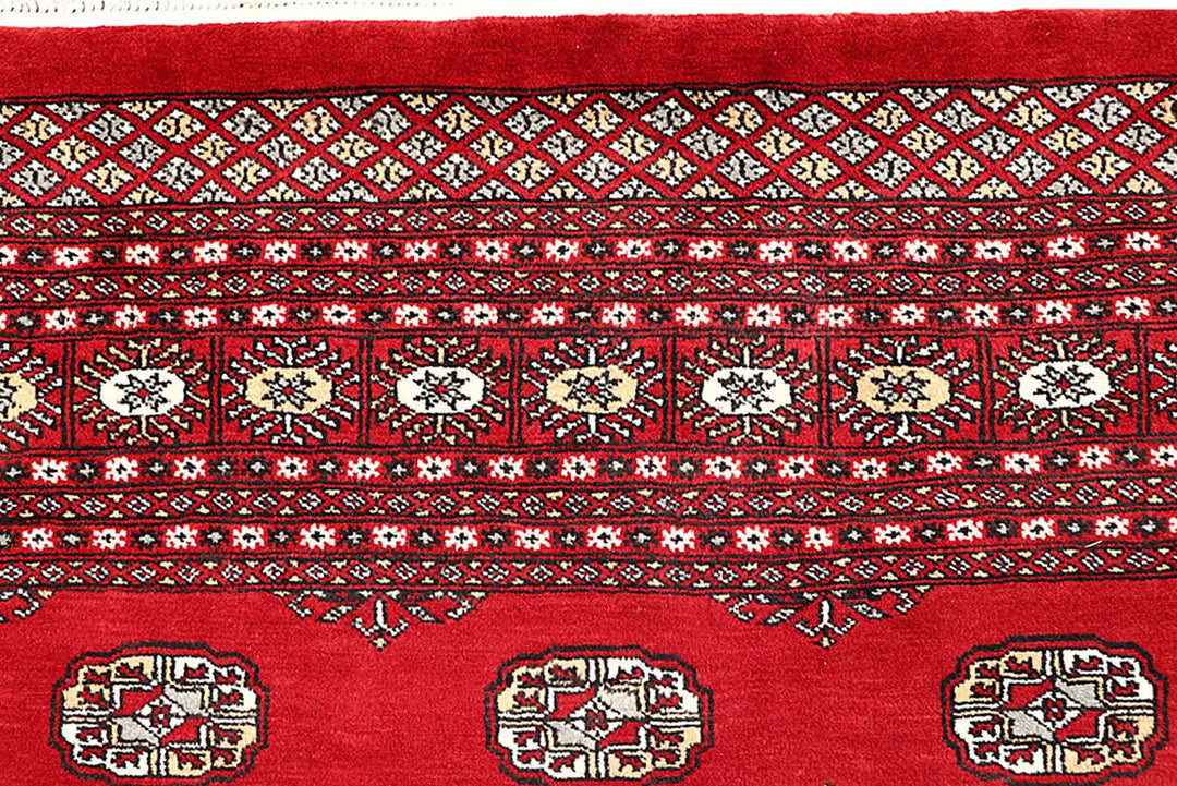 Red Pakistani Bokhara Rug 9' 3" x 12' 3" Hand-Knotted | No. QA16317