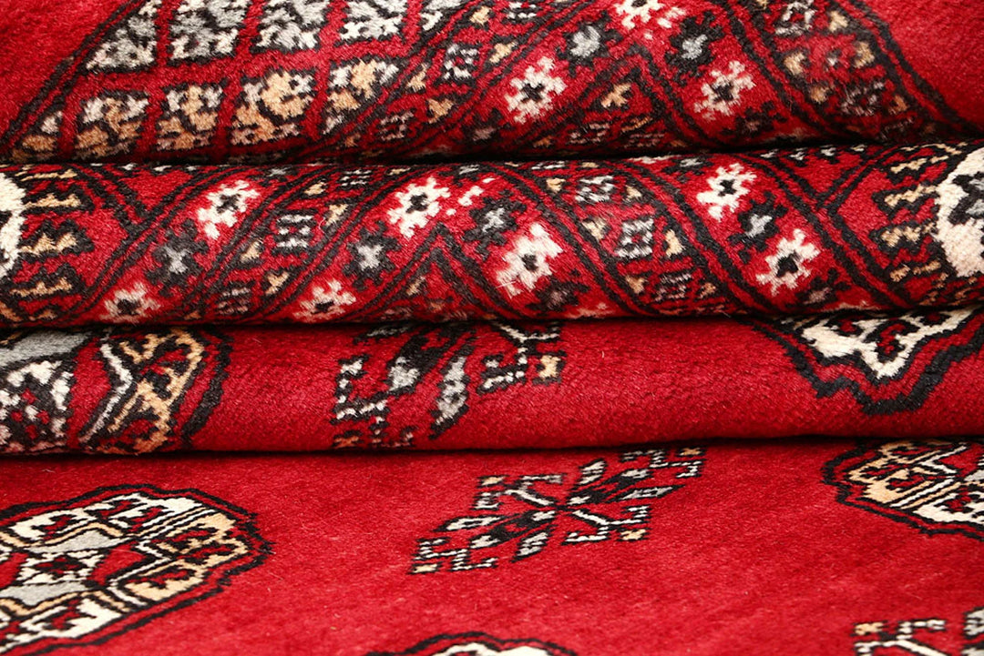 Red Pakistani Bokhara Rug 9' 3" x 12' 3" Hand-Knotted | No. QA16317