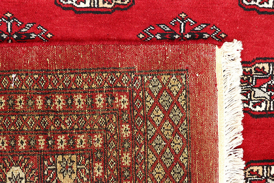 Red Pakistani Bokhara Rug 9' 3" x 12' 3" Hand-Knotted | No. QA16317
