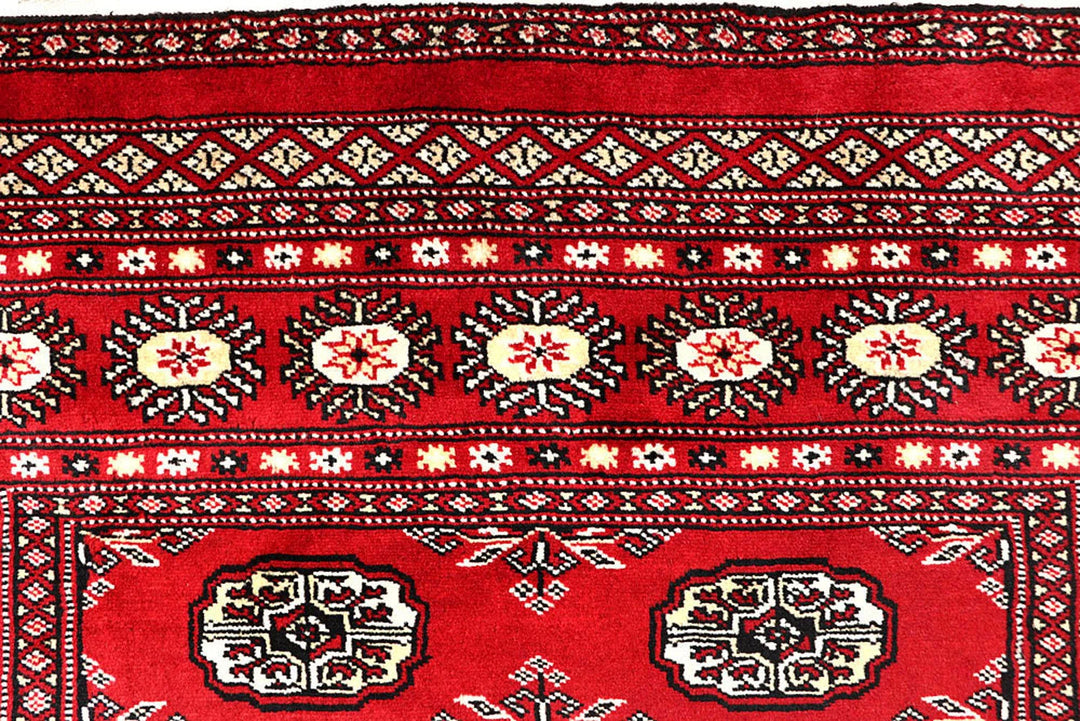 Red Pakistani Bokhara Rug 4' x 6' 9" Hand-Knotted | No. QA16471