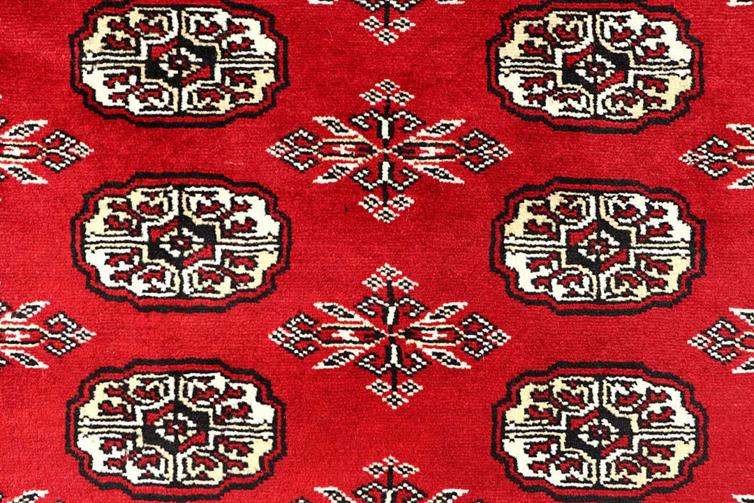 Red Pakistani Bokhara Rug 4' x 6' 9" Hand-Knotted | No. QA16471