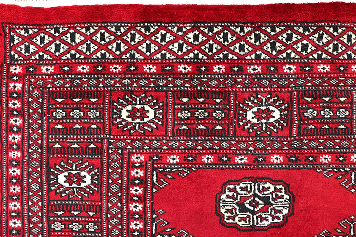 Red Pakistani Bokhara Rug 5' 7" x 8' 2" Hand-Knotted | No. QA17126