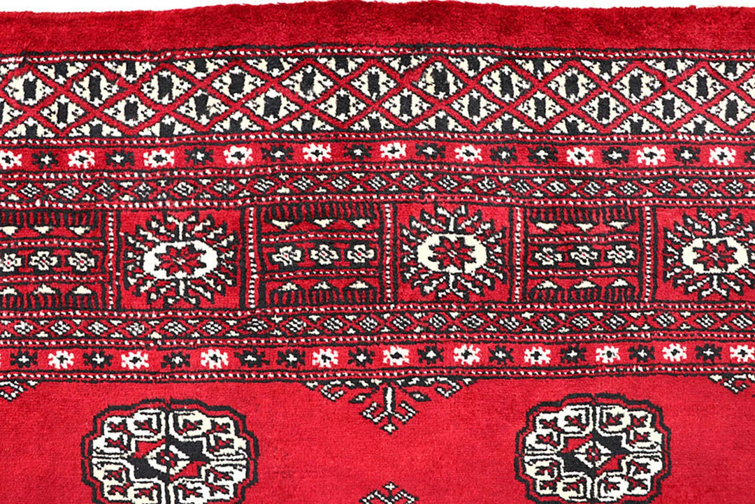Red Pakistani Bokhara Rug 5' 7" x 8' 2" Hand-Knotted | No. QA17126