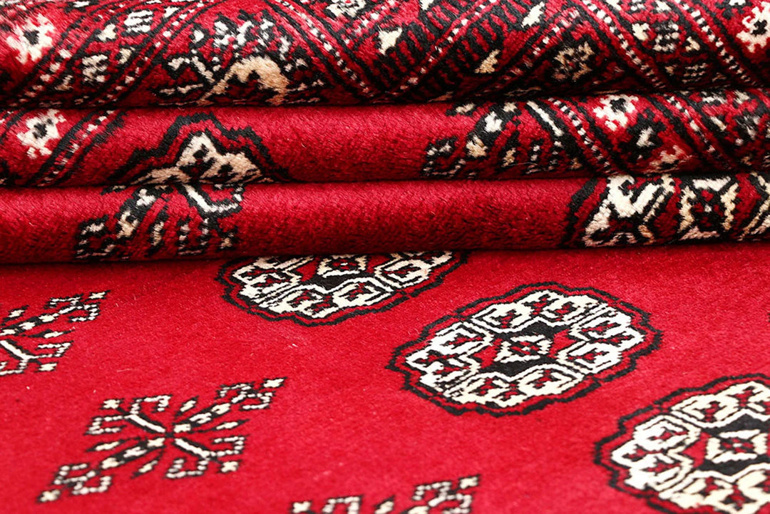 Red Pakistani Bokhara Rug 5' 7" x 8' 2" Hand-Knotted | No. QA17126