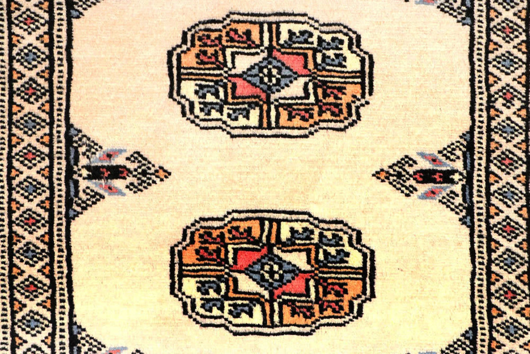 Ivory Pakistani Bokhara Rug 2' 6" x 9' 7" Hand-Knotted | No. QA17372
