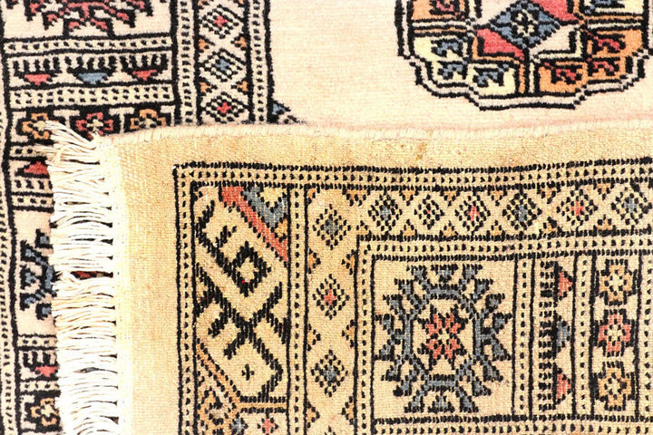 Ivory Pakistani Bokhara Rug 2' 6" x 9' 7" Hand-Knotted | No. QA17372