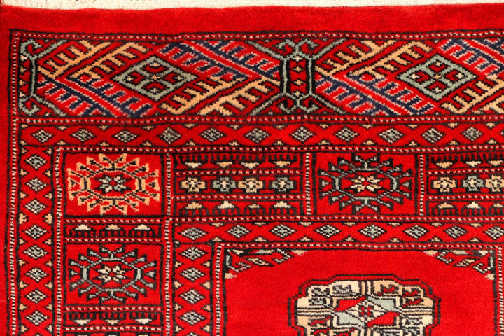 Red Pakistani Bokhara Rug 2' 7" x 9' 3" Hand-Knotted | No. QA17717