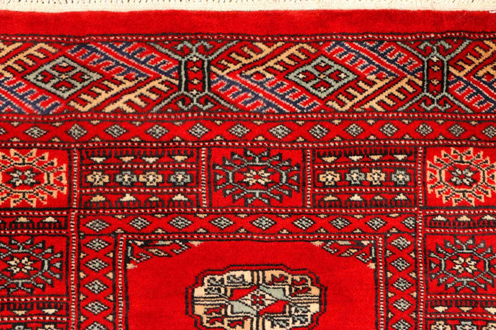 Red Pakistani Bokhara Rug 2' 7" x 9' 3" Hand-Knotted | No. QA17717